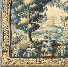 17th Century Antique Tapestry with Woodland Scene and Floral Border in Blue Tone