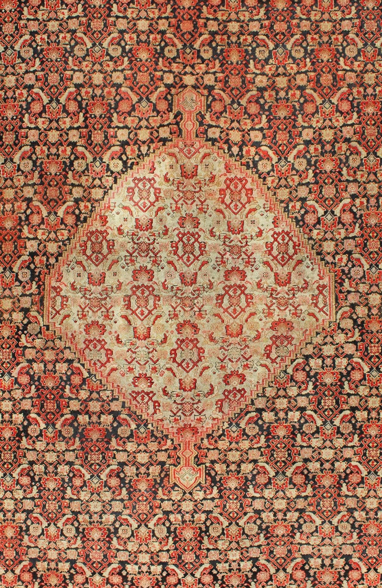 Malayer Antique Persian Senneh Rug with Unique Medallion and All-Over Design For Sale