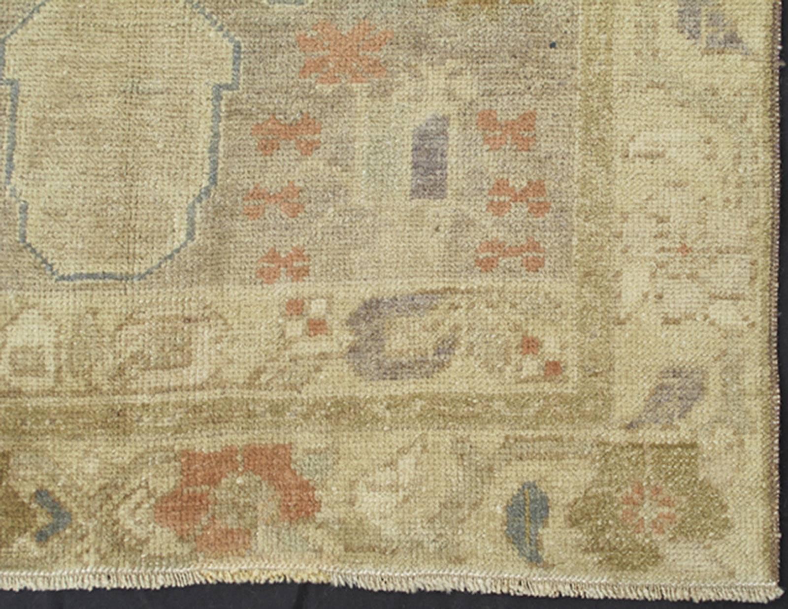 Vintage Turkish Oushak Runner with dual medallions and faint red and blue accents, rug mtu-95054, country of origin / type: Turkey / Oushak, circa mid-20th century.

This vintage Turkish Oushak carpet (circa mid-20th century) features a central