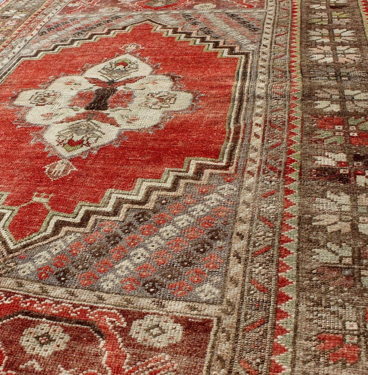 20th Century Turkish Oushak with Coral, Orange Red, Green, Salmon & Taupe Colors For Sale