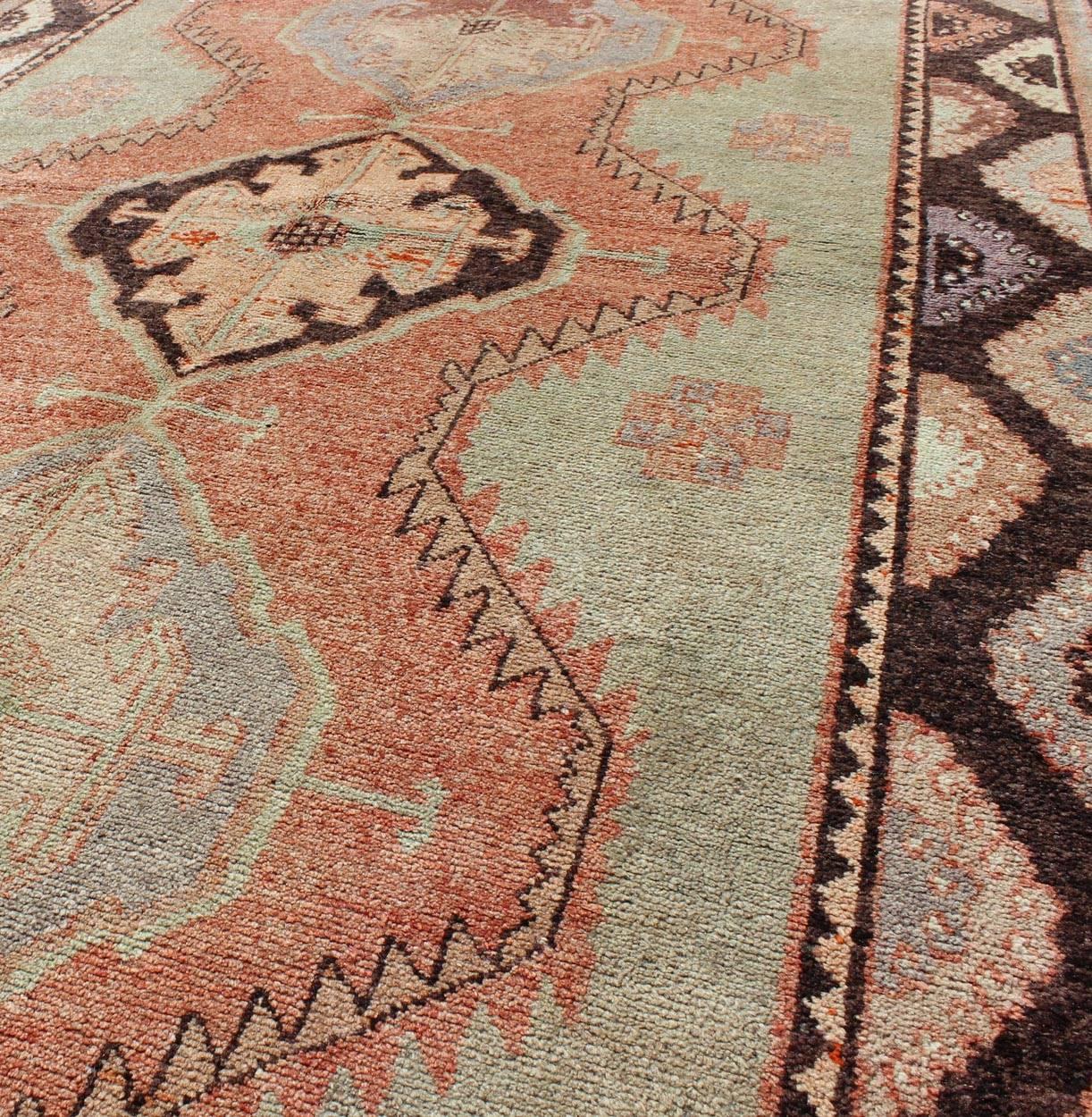 Mid-20th Century Turkish Oushak Rug with Geometric in Tangerine, Green and Brown For Sale