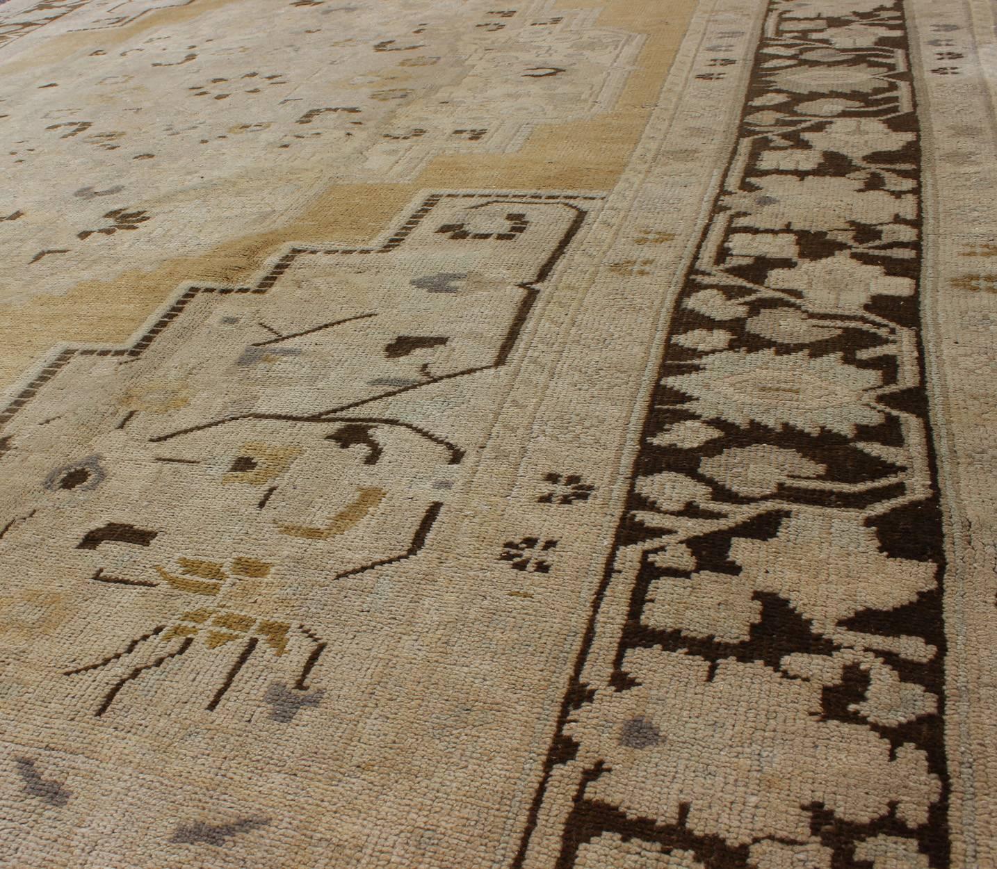 Turkish Oushak Rug in Pale Yellow, Taupe and Brown Border For Sale 1