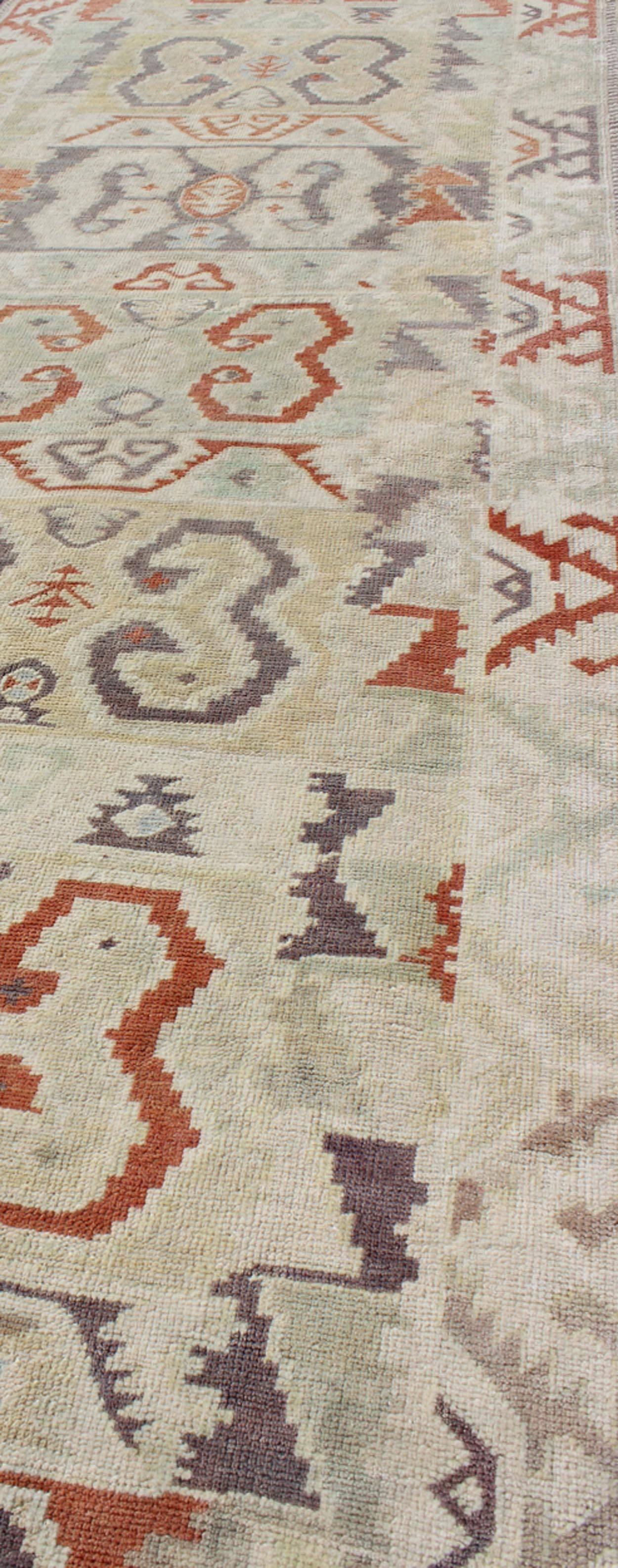 Mid-20th Century Unique Turkish Runner with Geometric and Tribal Elements 