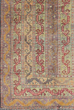 Vintage Turkish Rug with a All-Over Modern Design in Green, Red and Purple