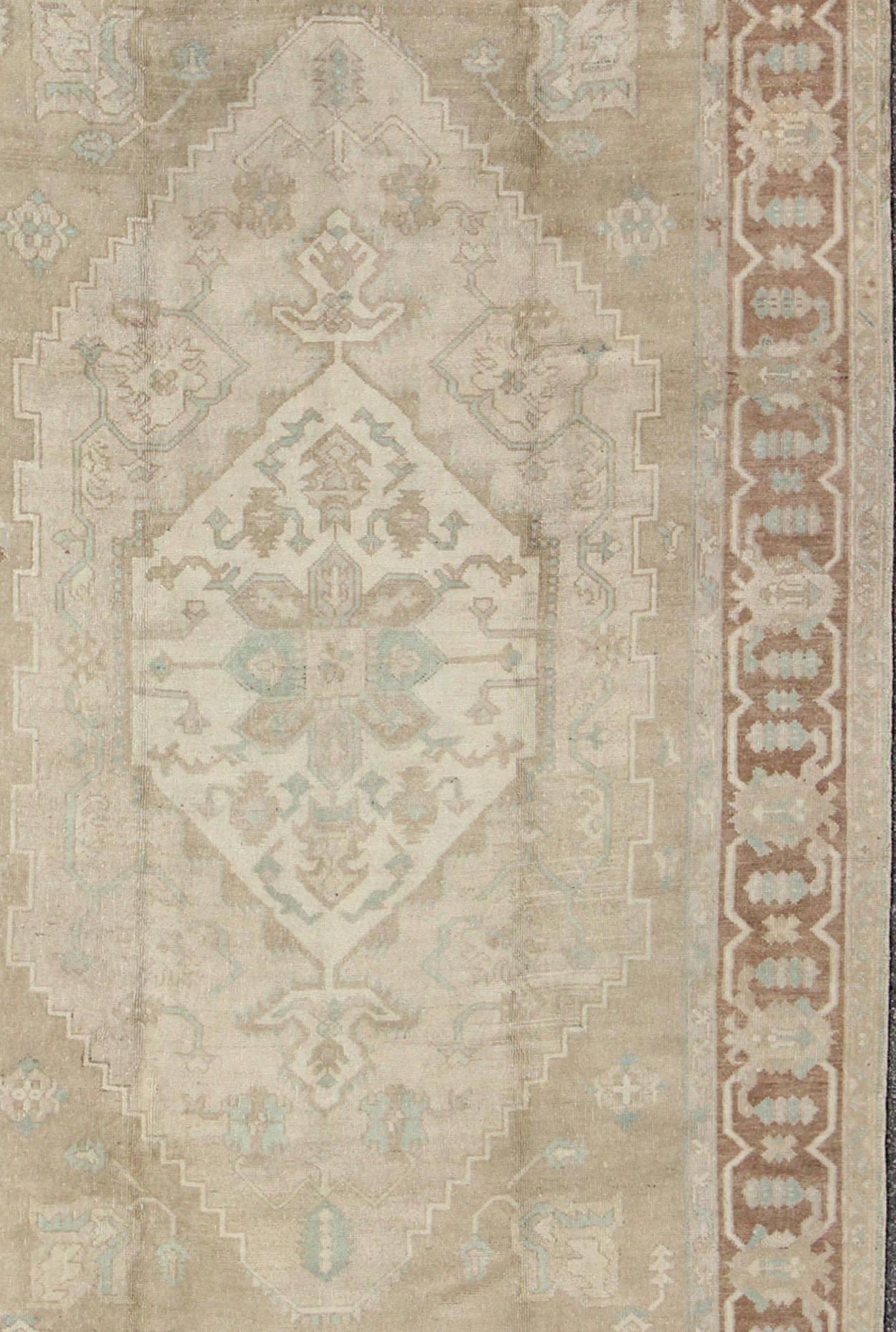Turkish Vintage Oushak Medallion Rug With Muted Colors and Earth Tones For Sale
