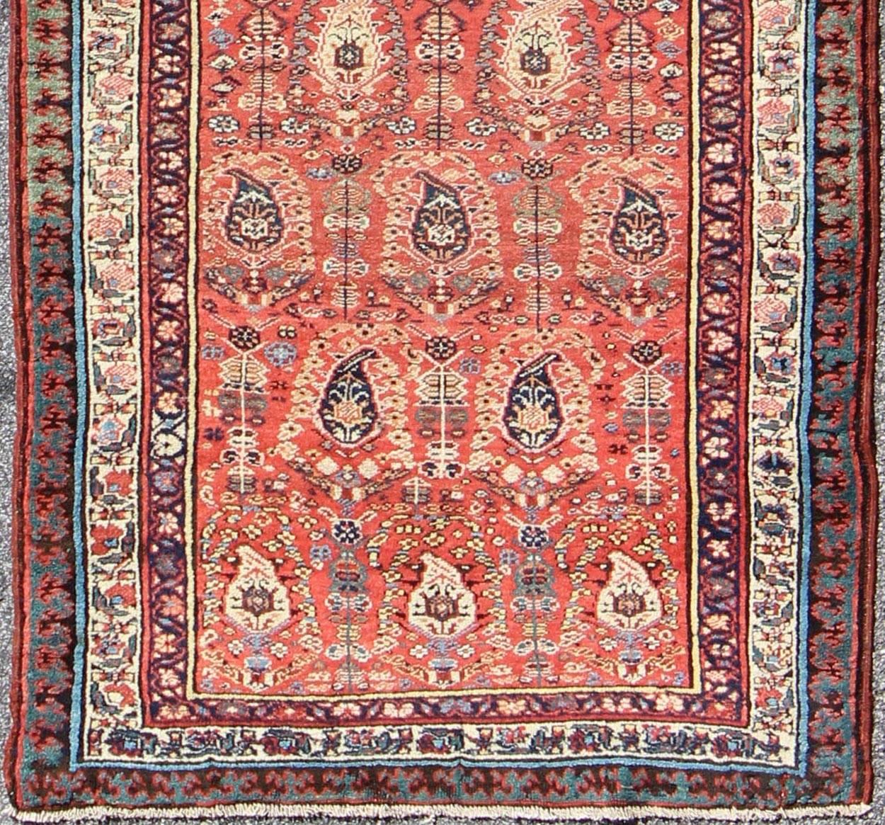 Antique Persian Serab Runner with Boteh and Paisley Design.

Measures: 3'9 x 10'.

This all-over Persian Serab has light terra cotta background and an ivory border. The elegant design in the field consists of a free-flowing Paisley pattern. The