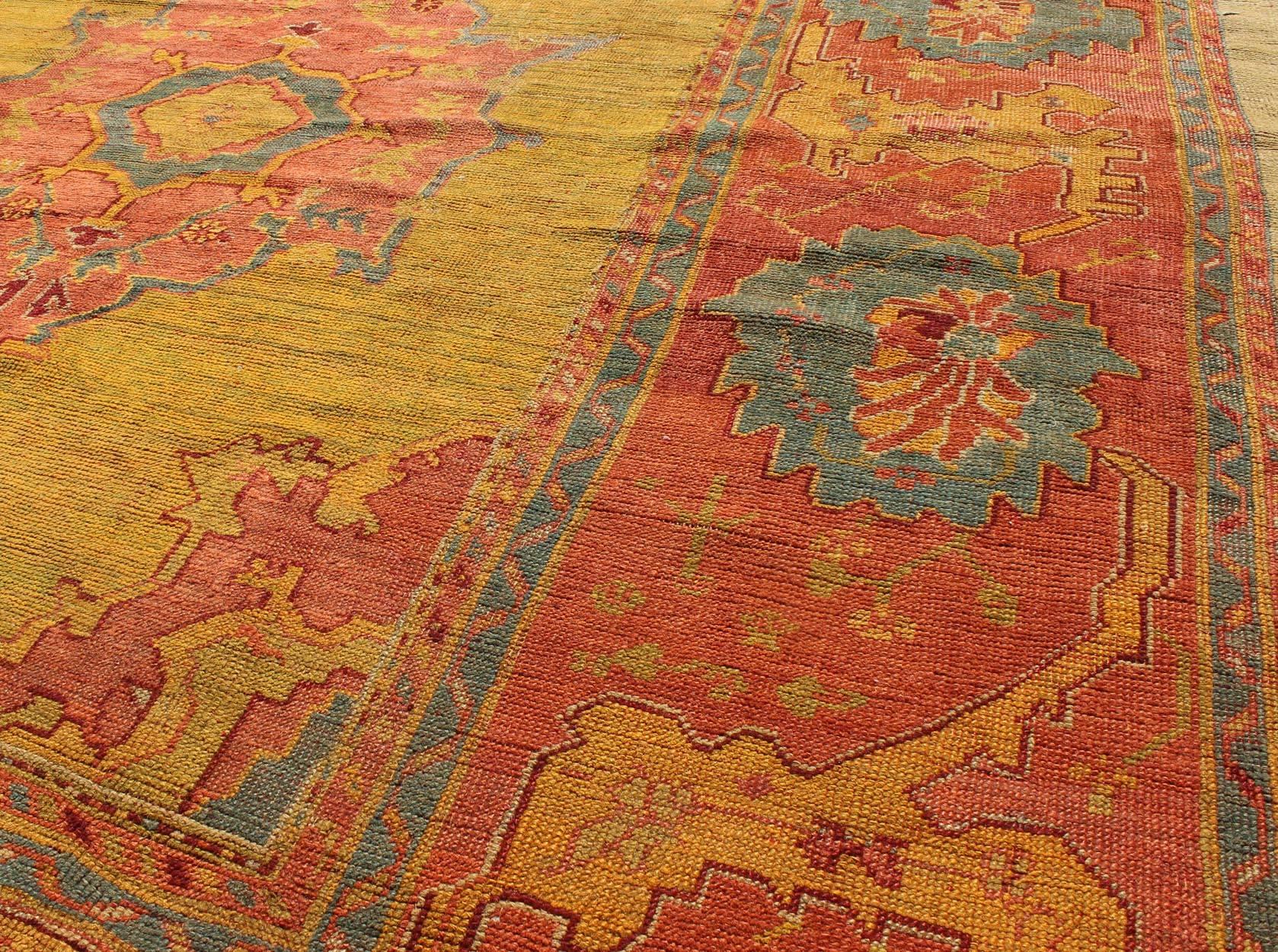 Antique Turkish Oushak Rug in  Saturated Gold, Orange Colors and Blue Accent  1