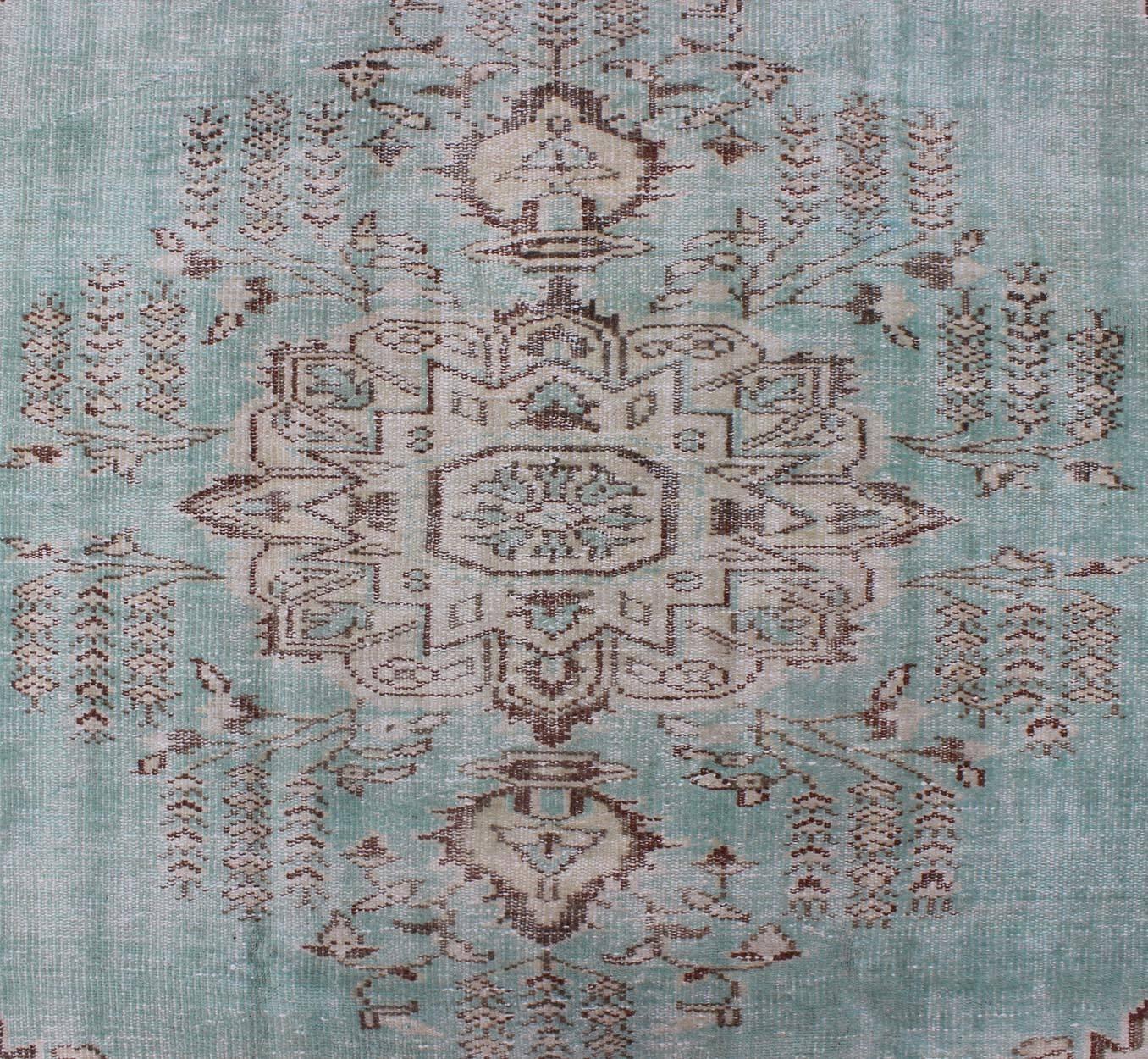 Mid-20th Century Vintage Oushak Rug with Aqua Color Background and Brown Highlights For Sale