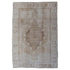 Vintage Oushak Rug with Soft Beige, Warm Taupe, and Ivory Tones