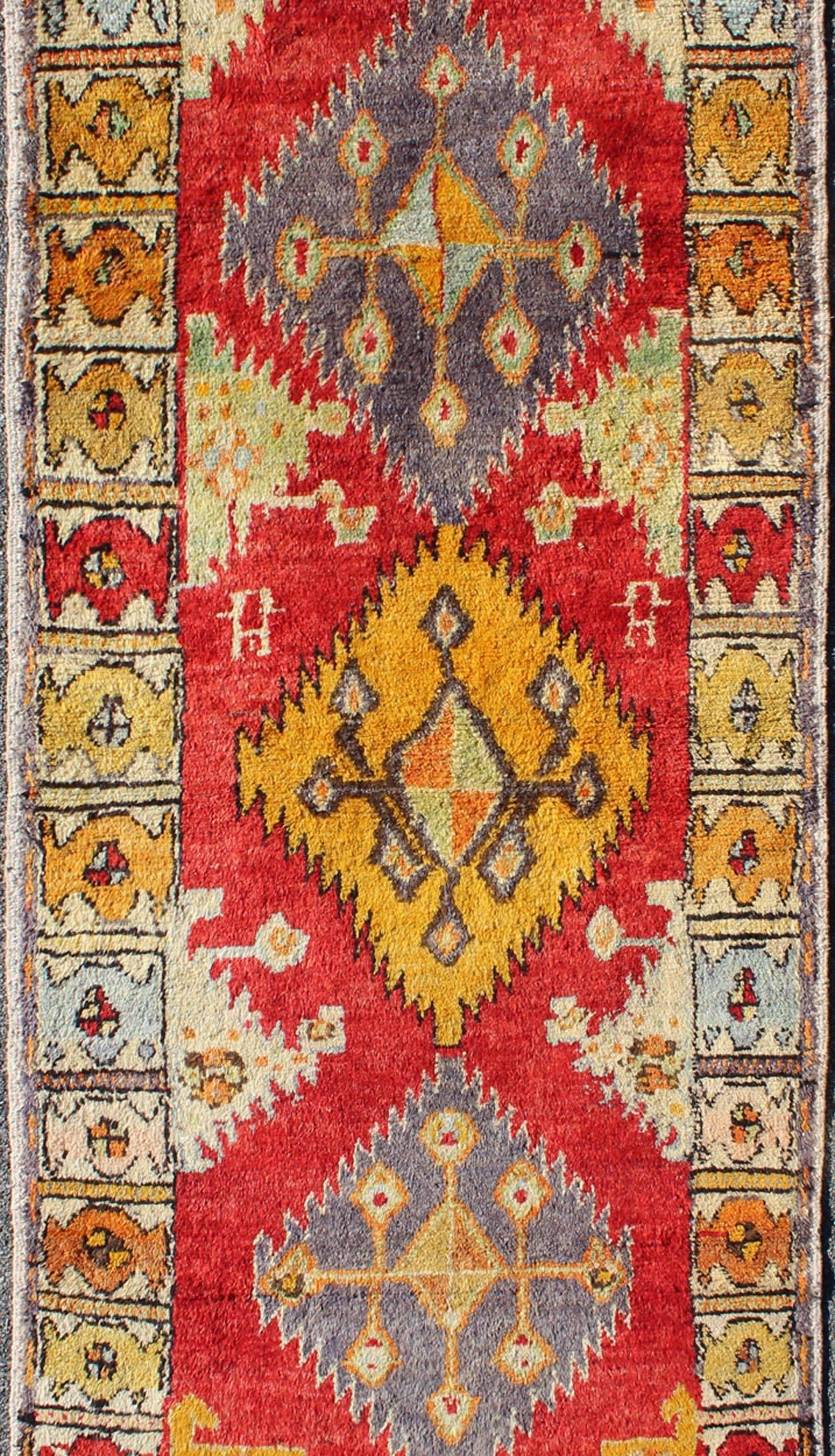 Tribal Turkish Oushak Runner with bright colors in Red, Gold, Yellow and Orange In Excellent Condition For Sale In Atlanta, GA