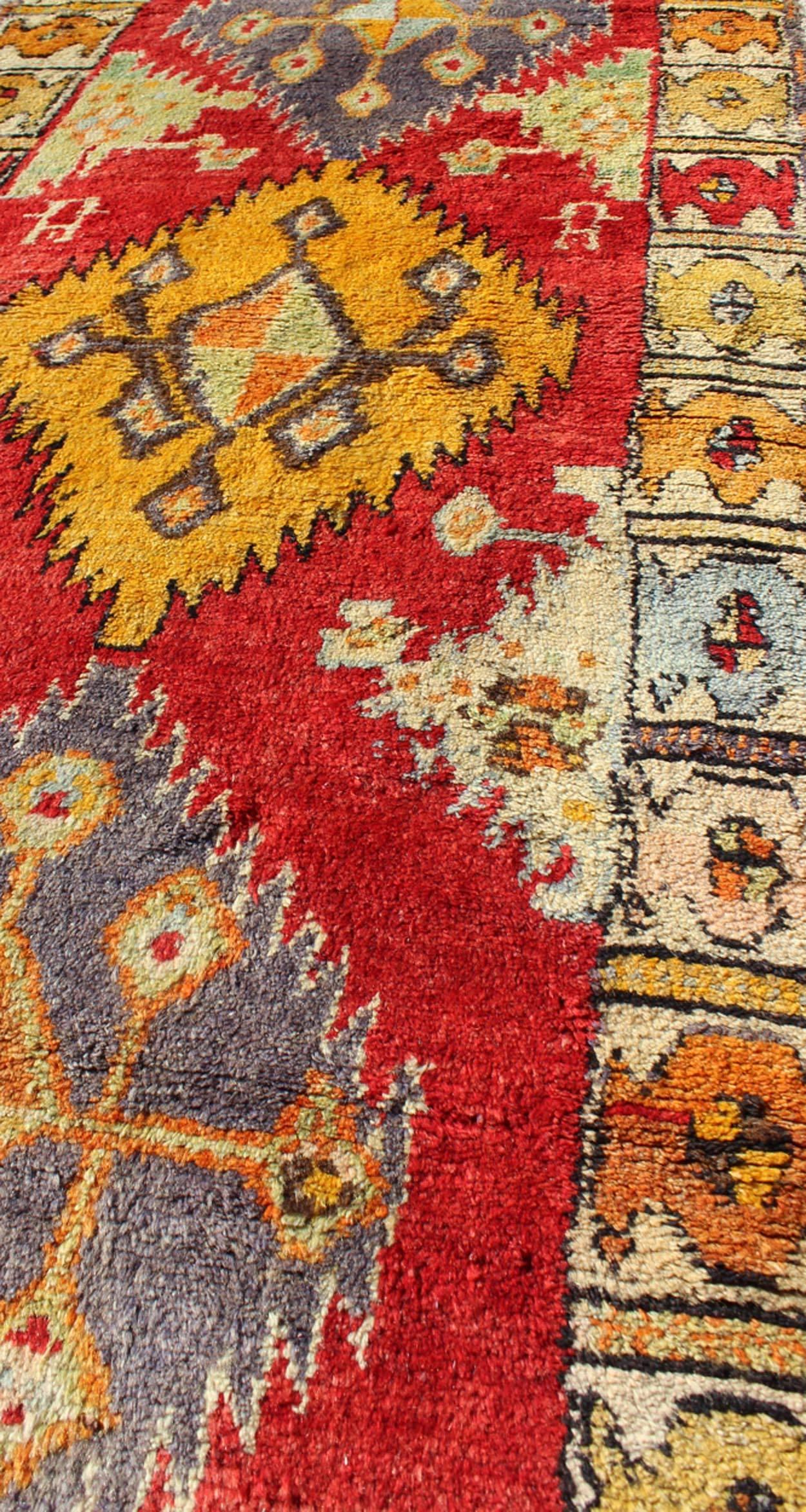 Tribal Turkish Oushak Runner with bright colors in Red, Gold, Yellow and Orange For Sale 1