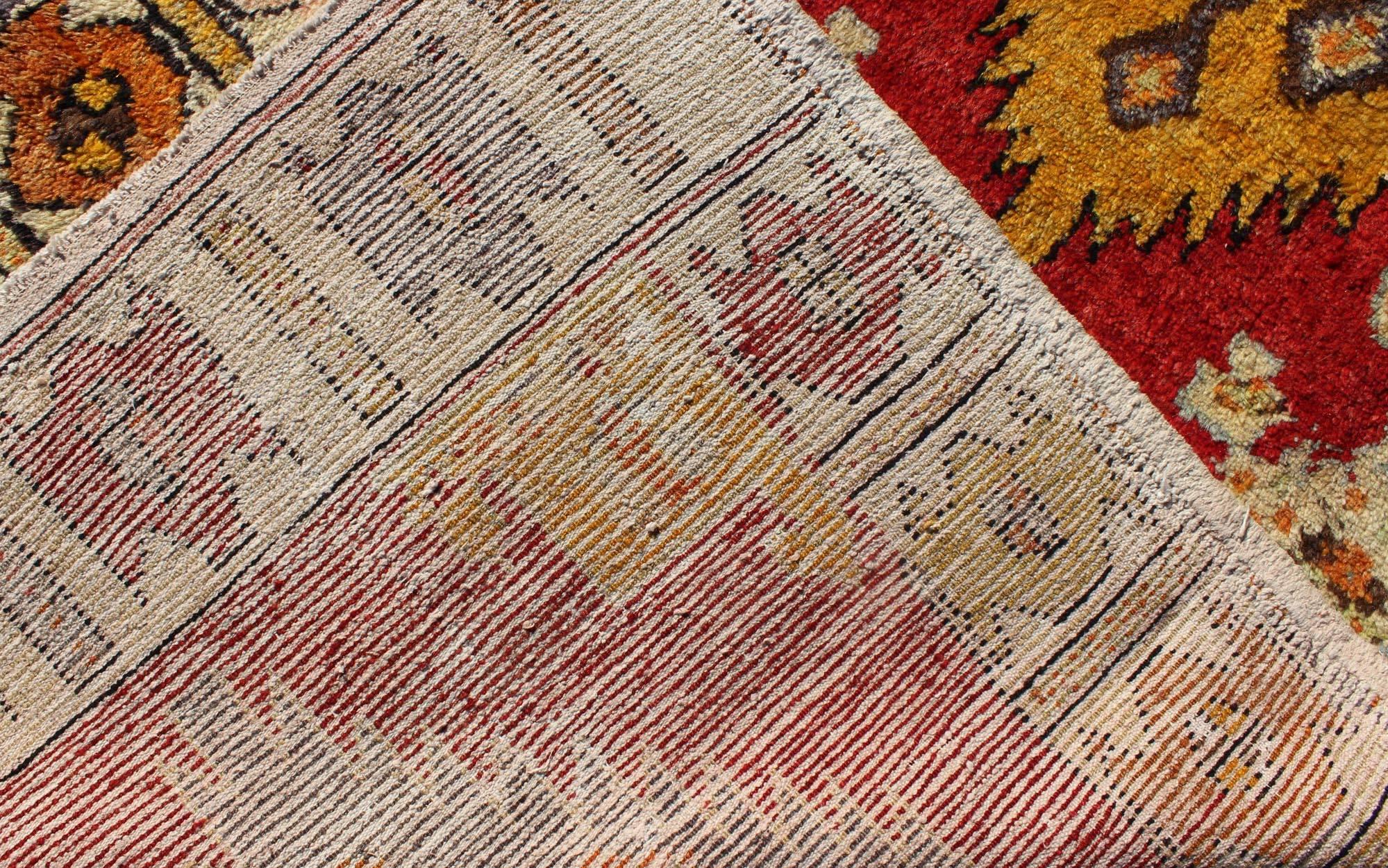 Tribal Turkish Oushak Runner with bright colors in Red, Gold, Yellow and Orange For Sale 3