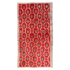 Vintage Turkish Tulu Rug with a Modern Design in Red Background
