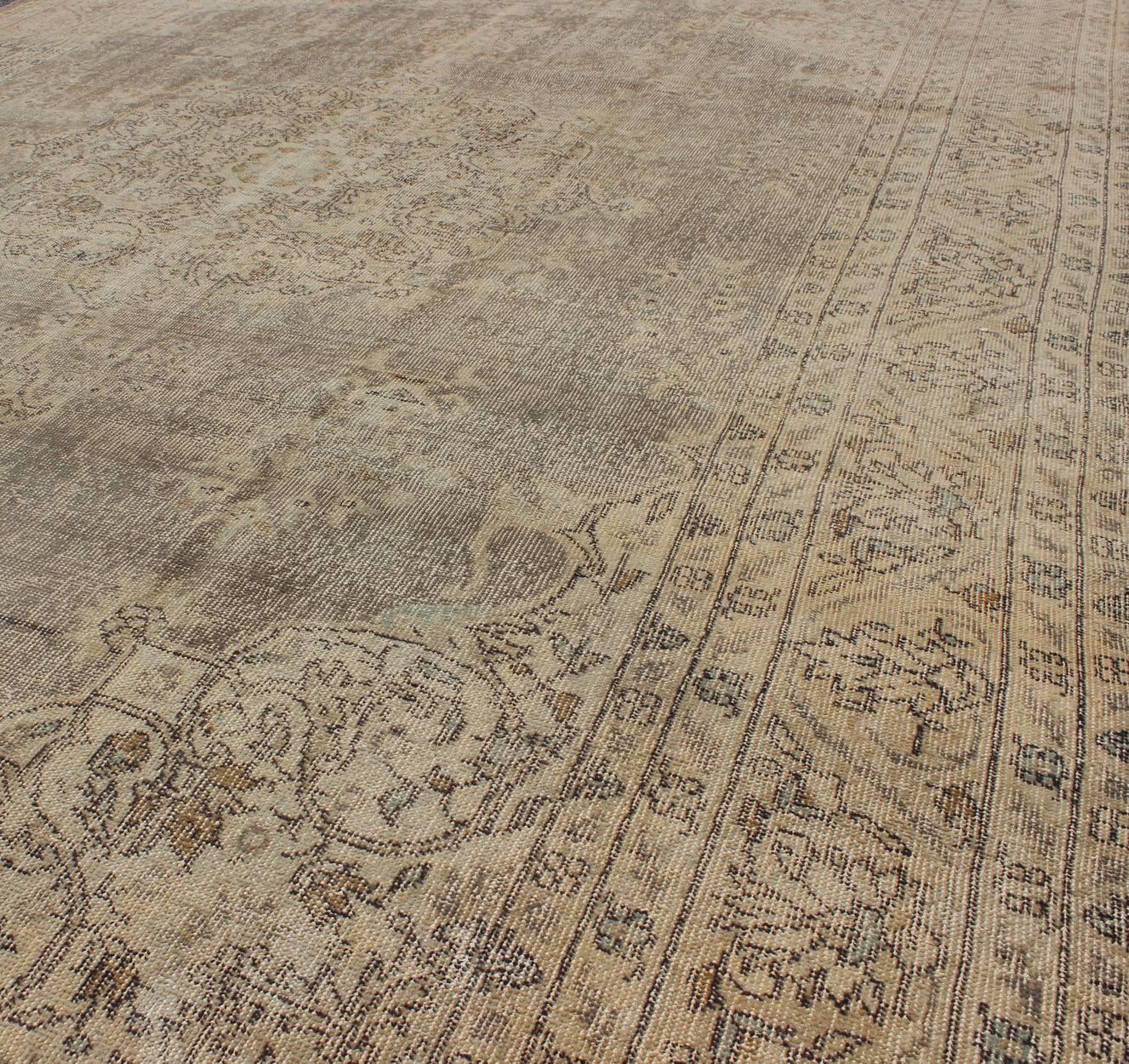 Distressed Turkish Carpet with Floral Design in Taupe, Gray, Brown and Ivory In Distressed Condition For Sale In Atlanta, GA