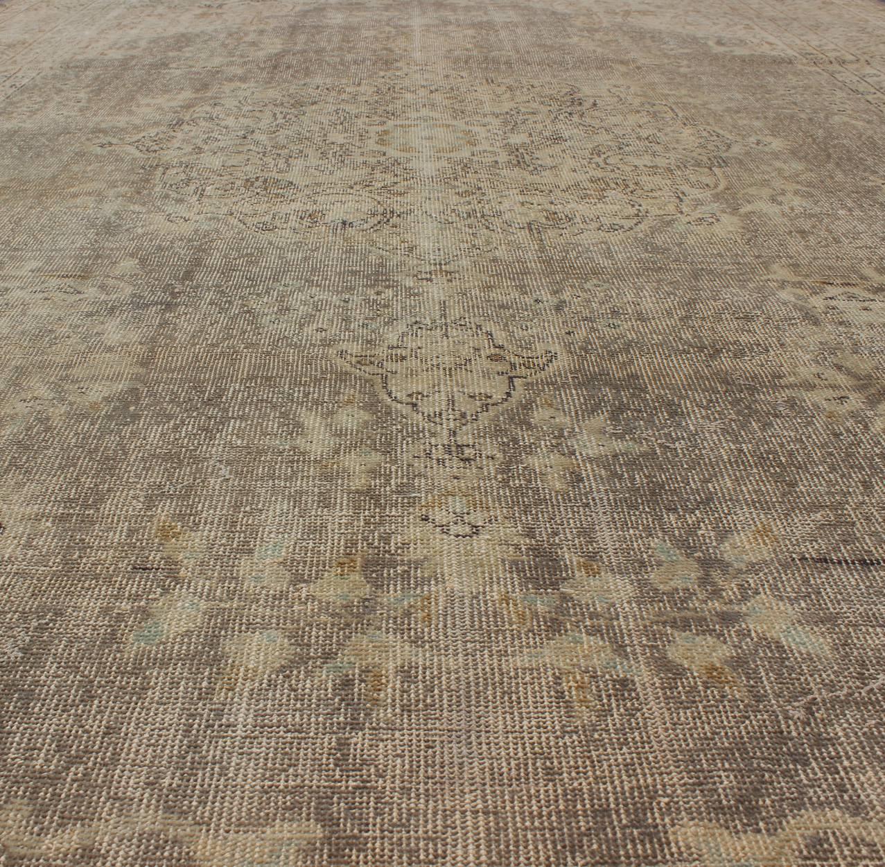 Mid-20th Century Distressed Turkish Carpet with Floral Design in Taupe, Gray, Brown and Ivory For Sale