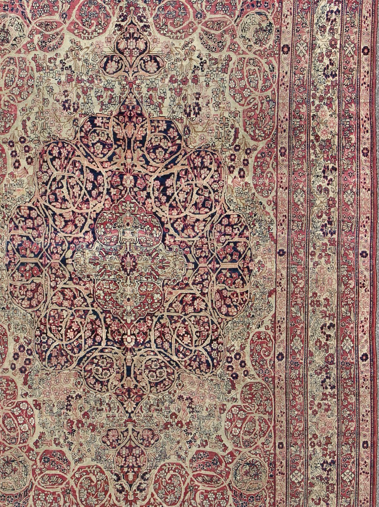 Hand-Knotted Antique Persian Lavar Kerman Rug with Large Medallion and intricate design