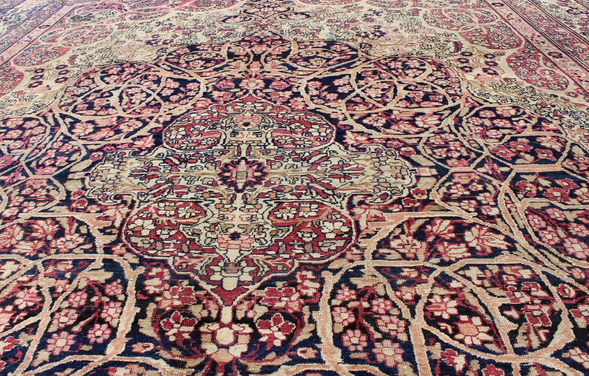 Late 19th Century Antique Persian Lavar Kerman Rug with Large Medallion and intricate design