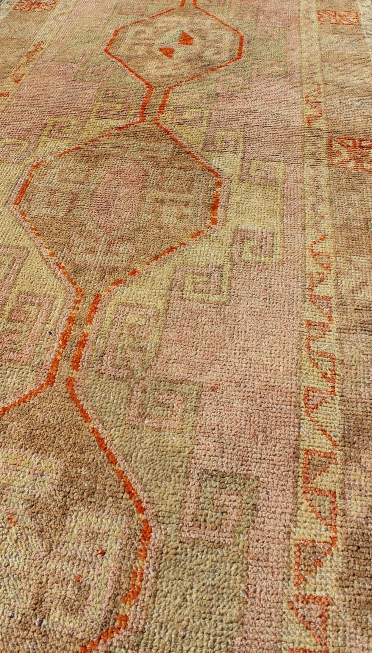 Hand-Knotted Oushak Vintage Runner in Soft Pink and Light Green, Taupe and Orange Highlights