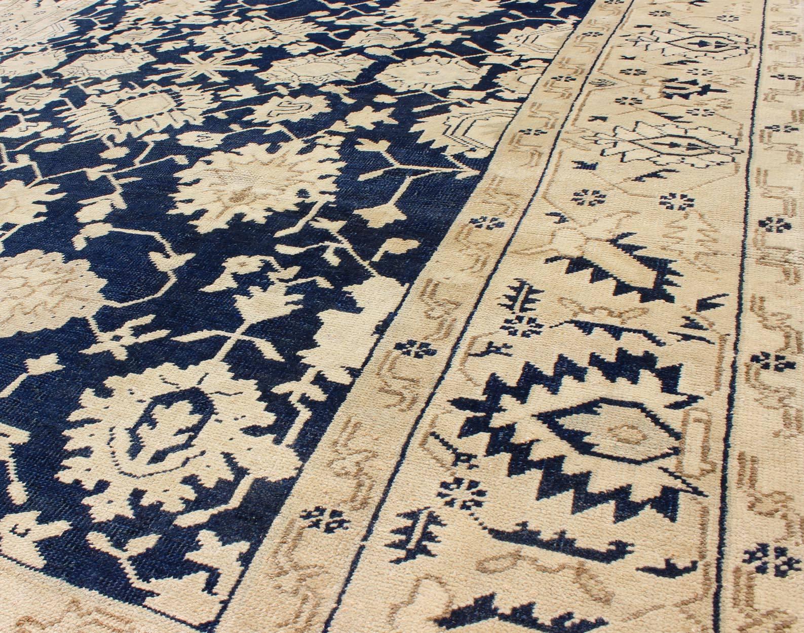 Unique Turkish Oushak Rug with Floral Design in Dark Blue, Cream and Light Brown In Excellent Condition For Sale In Atlanta, GA