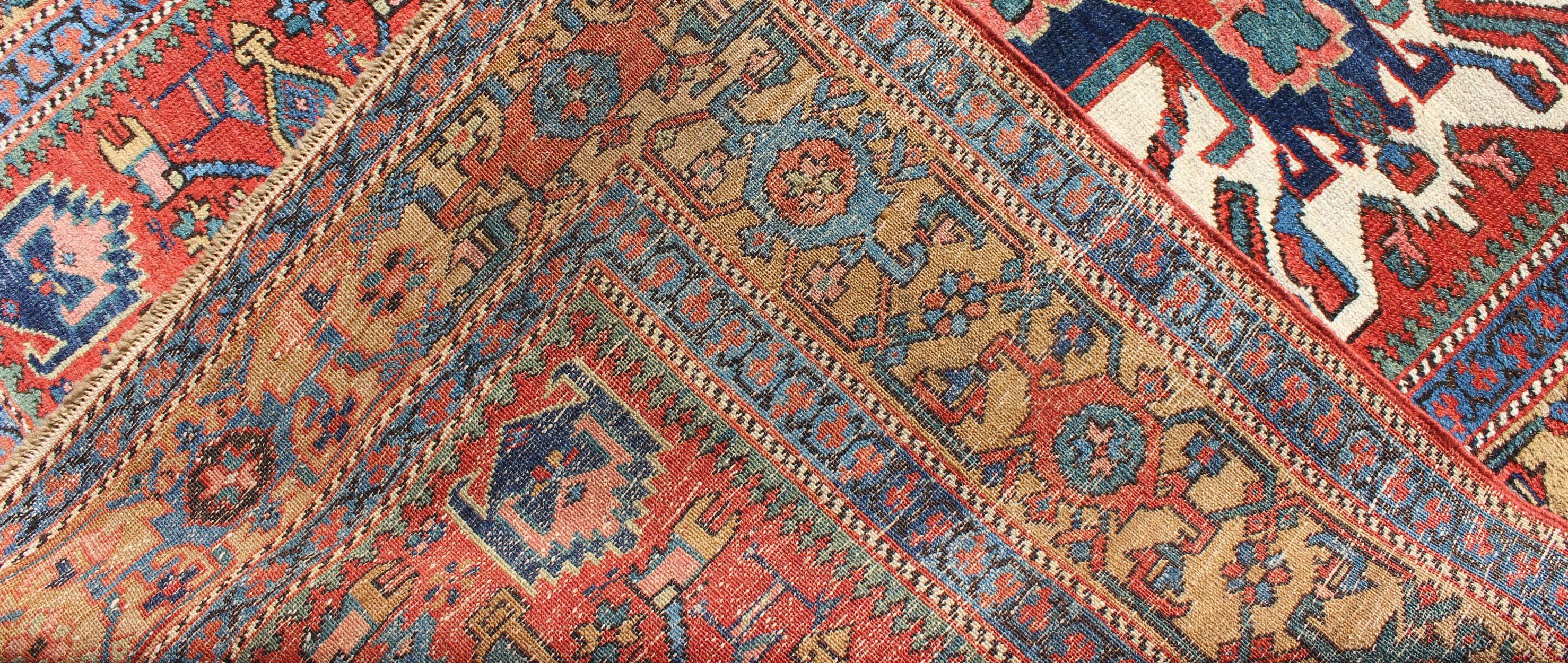 Wool Antique Persian Karajeh-Serapi with Tribal Design For Sale