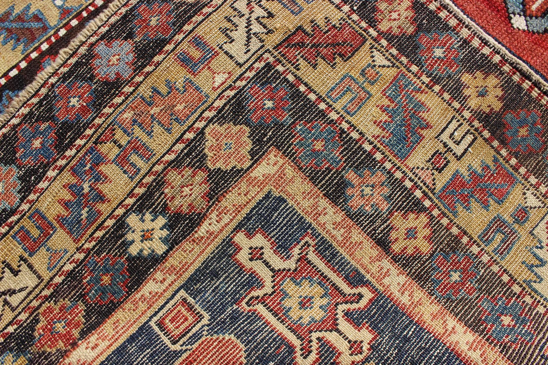 Wool Antique Hand Knotted Qaraqashli Caucasian Rug with Tribal Medallion Design For Sale