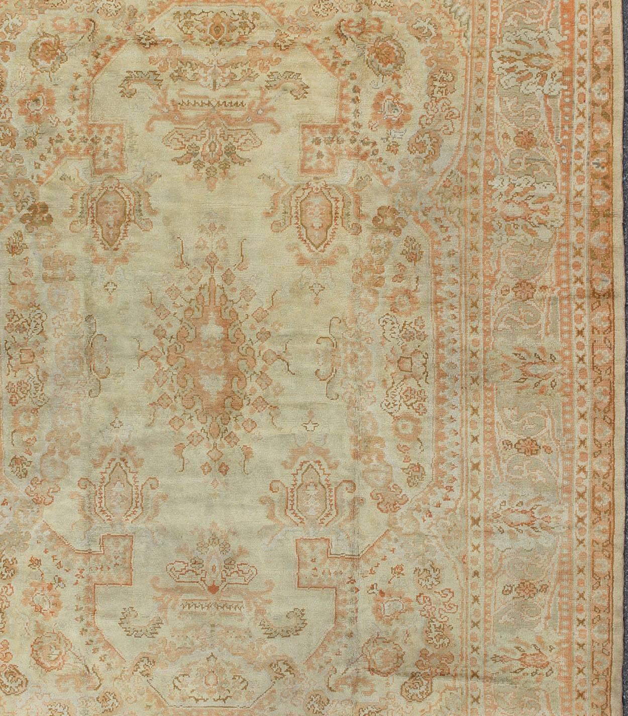 Large Antique Oushak Carpet in Ivory Background, Taupe, Gray , Green and Salmon In Excellent Condition In Atlanta, GA