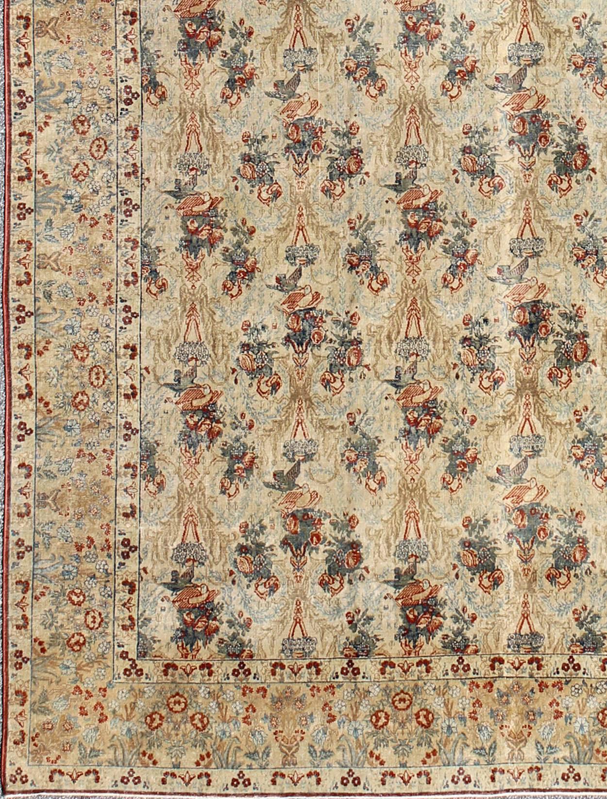 Large antique fine Tabriz Persian carpet in ivory background with flowers and bird design. Keivan Woven Arts / rug /E-0609. Antique fine Persian rug, Haj Jalili Tabriz Persian rug. Fine Persian Tabriz
This unique all-over pattern finely woven