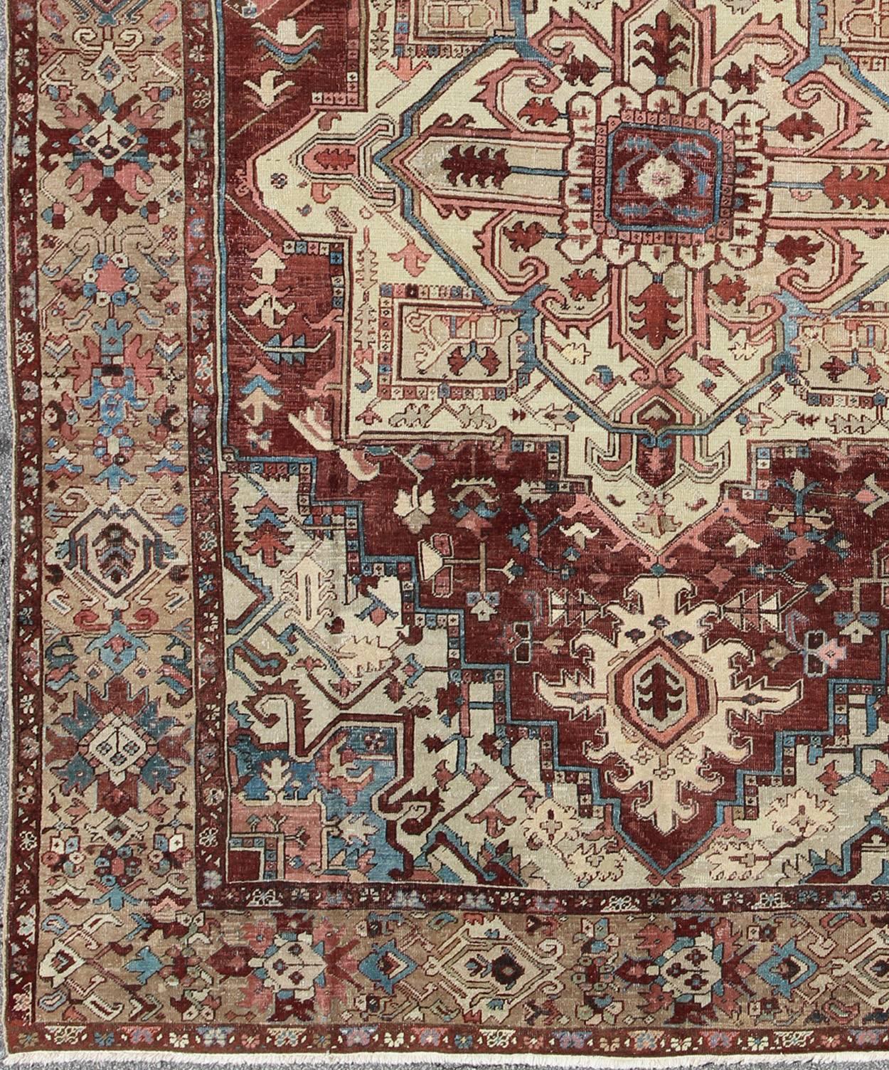 Antique Persian Serapi Carpet With Medallion In Reddish Brown, Tan and Light Blue. Keivan Woven Arts / rug E-0402, country of origin / type: Iran / Serapi, circa 1890. 
Measures: 9'10 x 11'10
This late 19th Century Persian Serapi Rug has a center