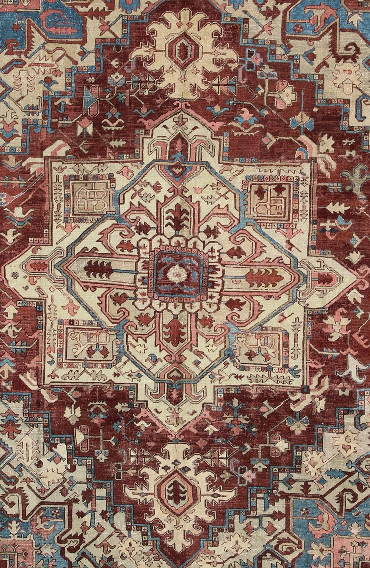Hand-Knotted Antique Persian Serapi Carpet With Medallion In Reddish Brown Tan and Light Blue For Sale