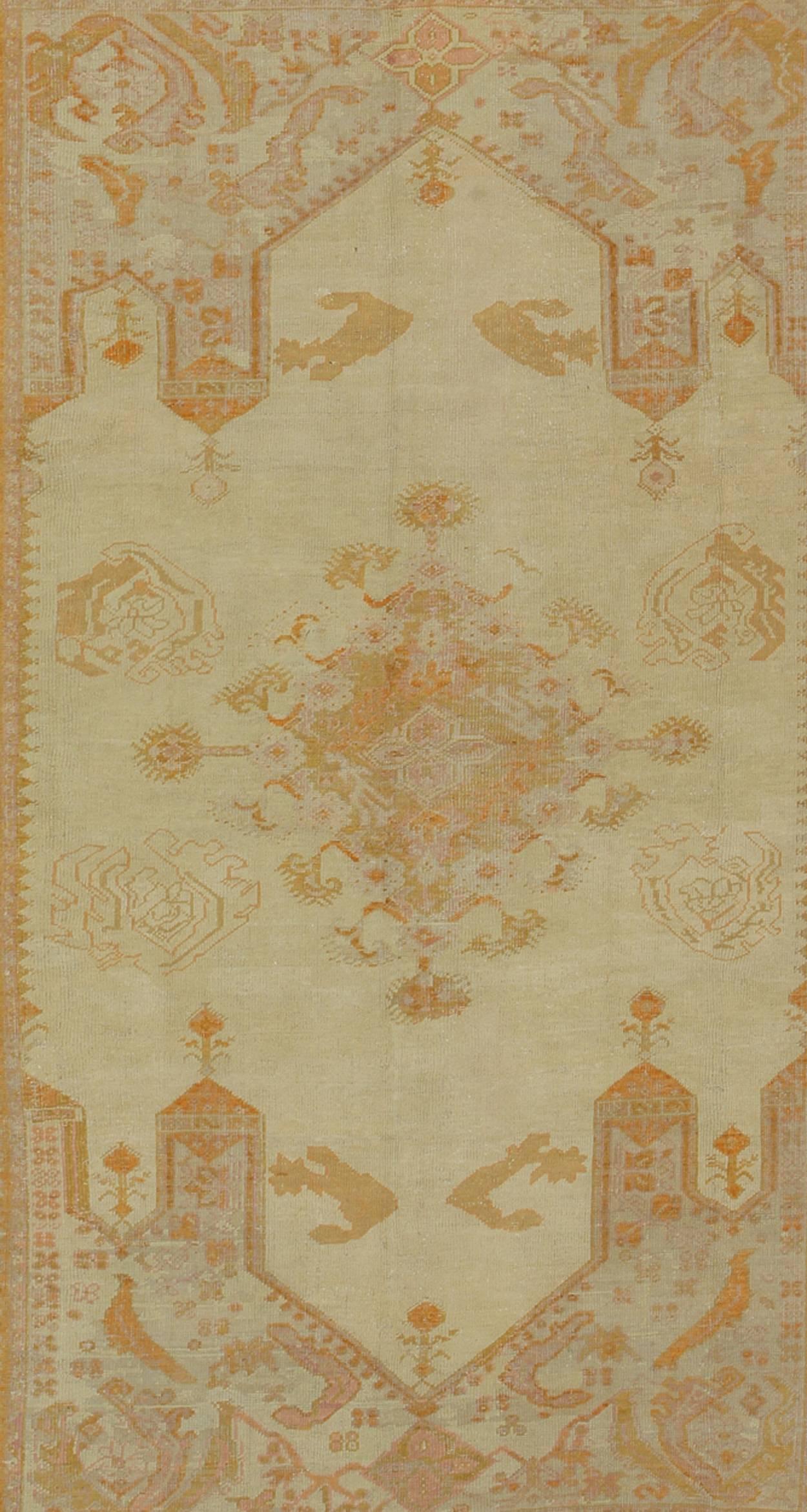 Hand-Knotted Antique Turkish Oushak Rug with Geometric in Cream, Lavender, Green and Orange
