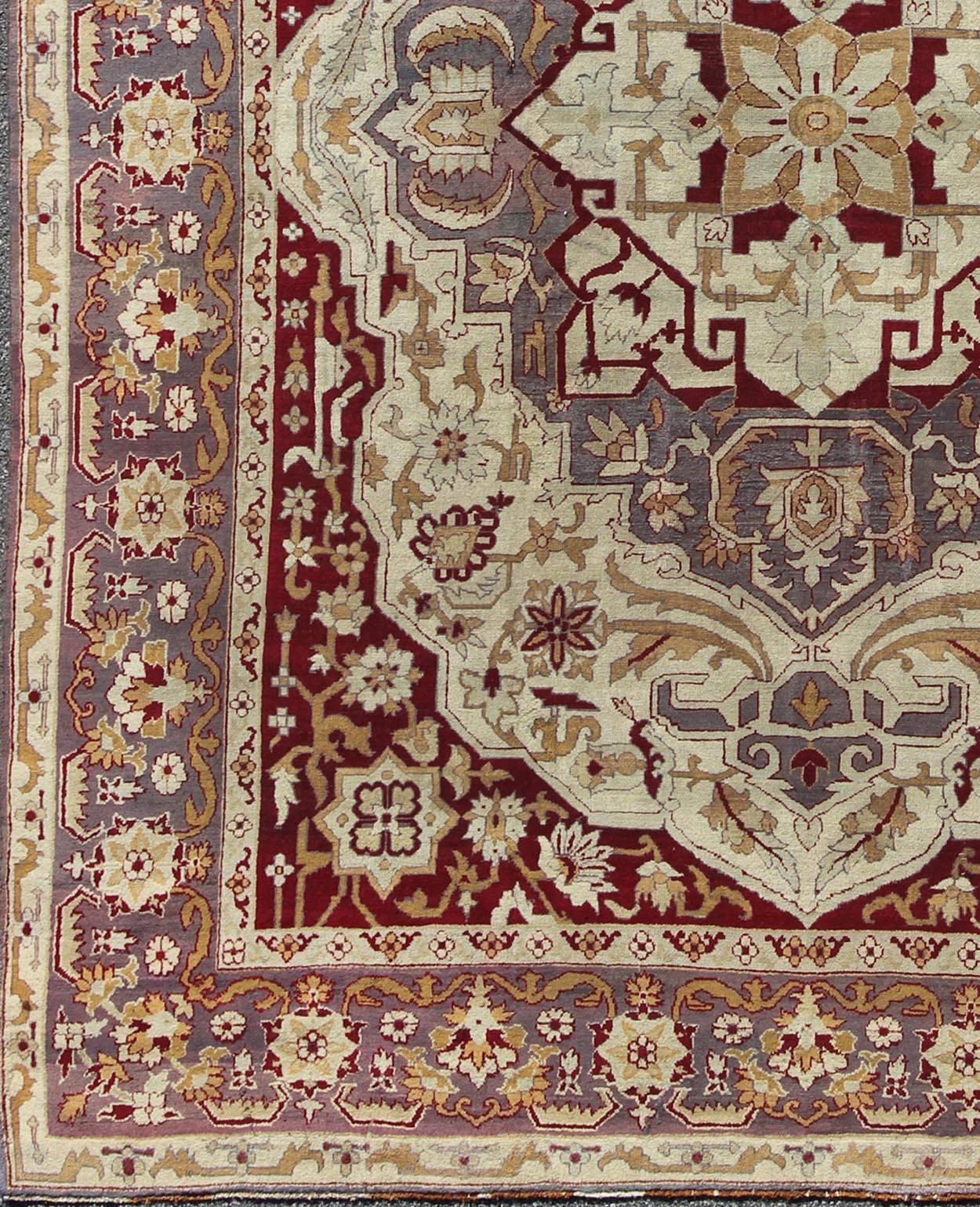 Antique 19th Century Indian Agra Carpet with a Floral Medallion Design in Cream, Maroon, Gold, and Gray/Light Purple. Keivan Woven Arts/ Rug/D-0101, country of origin / type: India / Agra, circa 1880's.  Antique Agra Carpet
Measures: 10' x 12'5