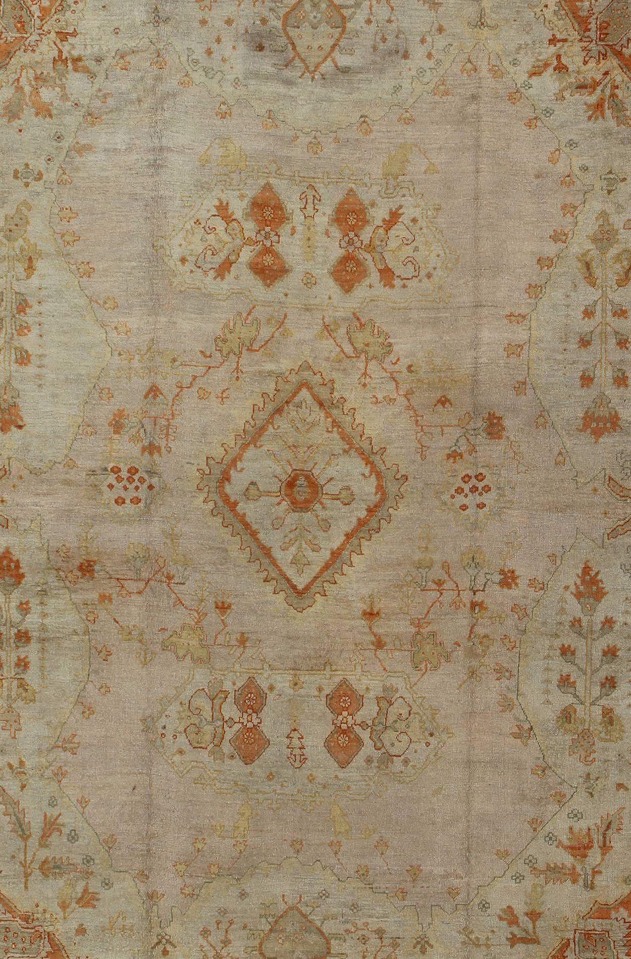 Antique Turkish Oushak Rug in green, Yellow, blush, apricot and light blue In Excellent Condition In Atlanta, GA