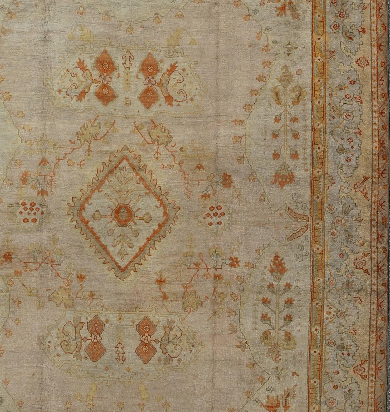 19th Century Antique Turkish Oushak Rug in green, Yellow, blush, apricot and light blue