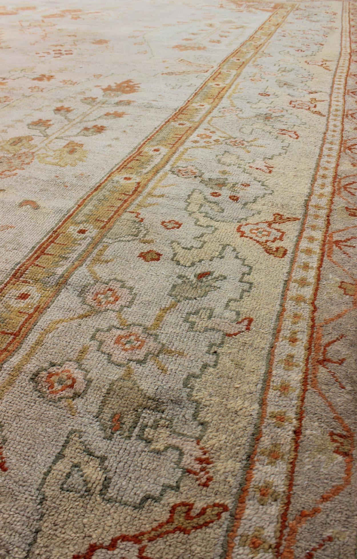 Antique Turkish Oushak Rug in green, Yellow, blush, apricot and light blue 1