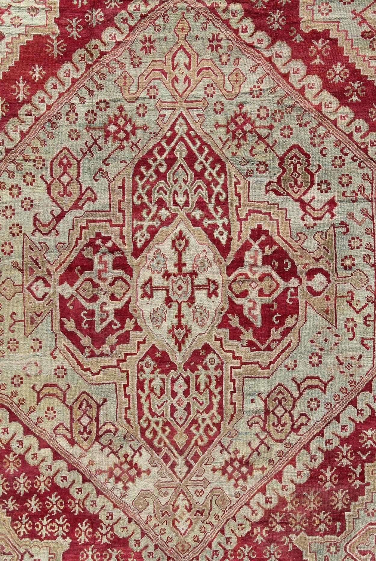 Oushak Antique Turkish Ghiordes 19th Century Rug in Raspberry Red, Ice Blue & L. Green For Sale