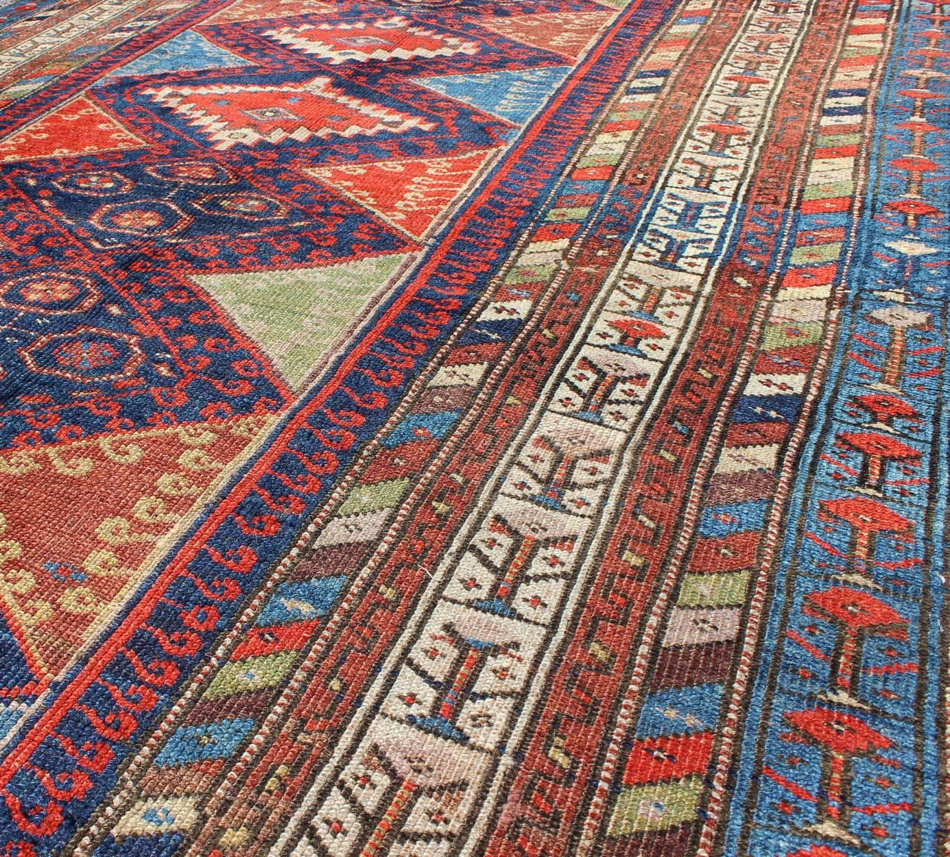 Antique Kurdish Kazak with Tribal and Geometric Motifs In Blue, red & Green In Good Condition For Sale In Atlanta, GA