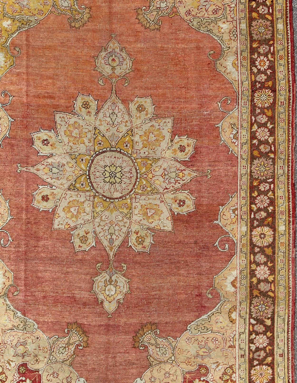 Antique Oushak Medallion Rug in Rose, Pale Green, Light Blue, Gold and Brown  In Good Condition For Sale In Atlanta, GA