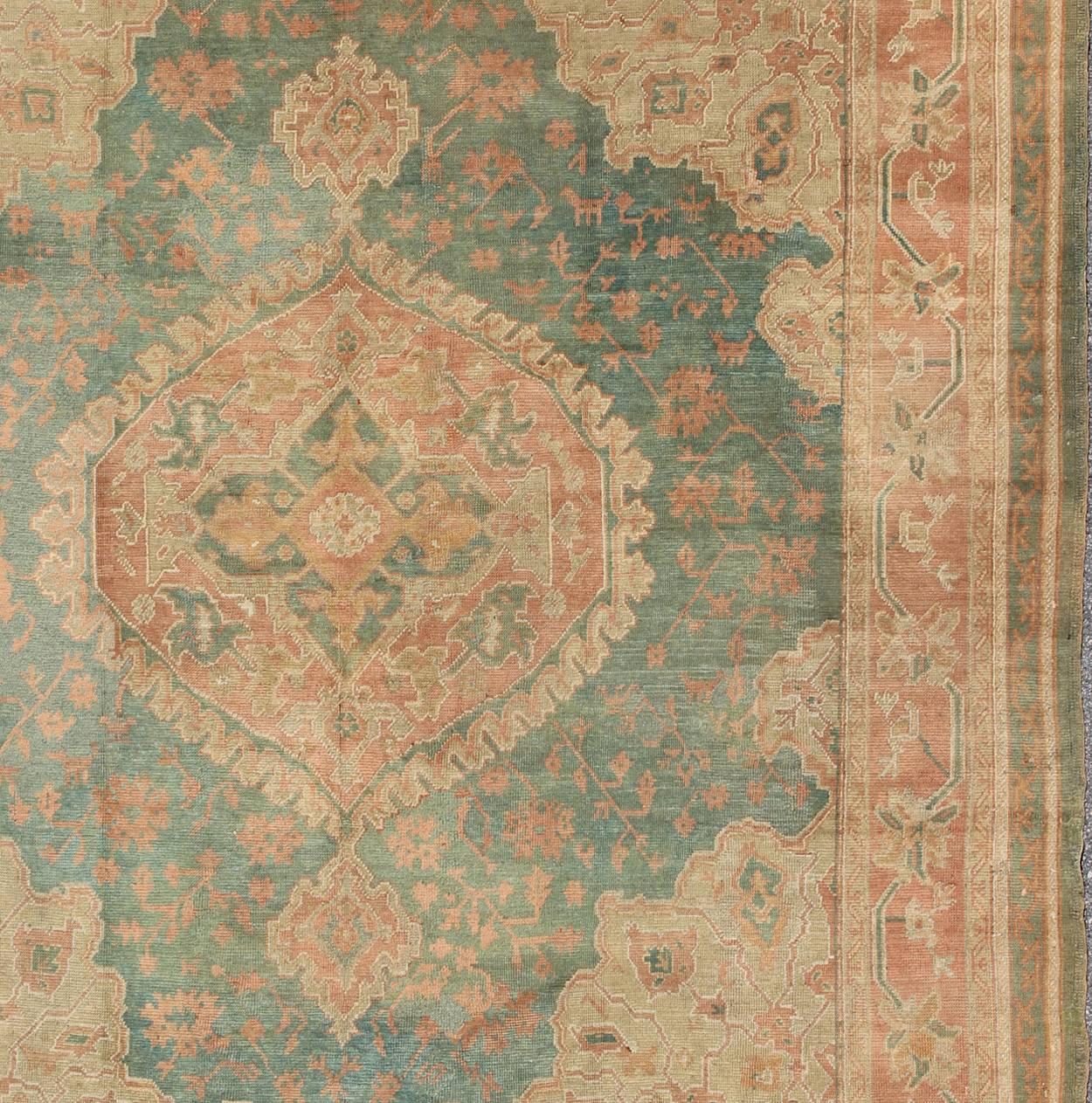 Antique Turkish Medallion Oushak Rug in Teal Green, Rose and Buttery Colors In Good Condition In Atlanta, GA