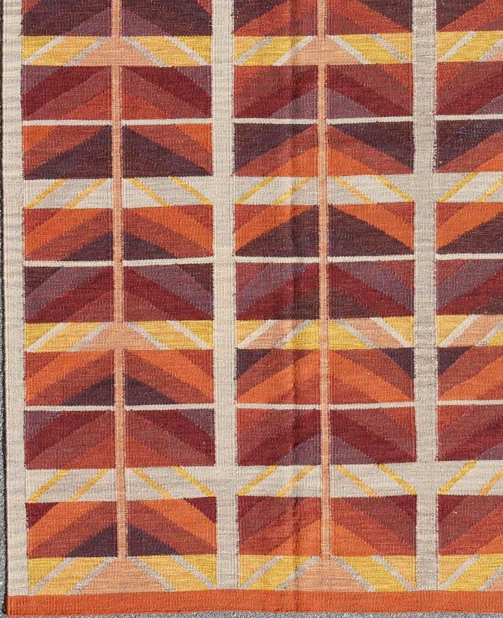 Large Modern Swedish Design Rug with Architectural and Geometric Pattern.
This Scandinavian flat-weave is inspired by the work of Swedish textile designers of the early to mid-20th Century. With a unique blend of historical and modern design, this