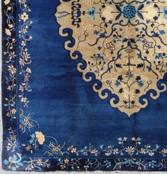 Antique Chinese Peking Rug in Royal Blue and Golden Camel Medallion