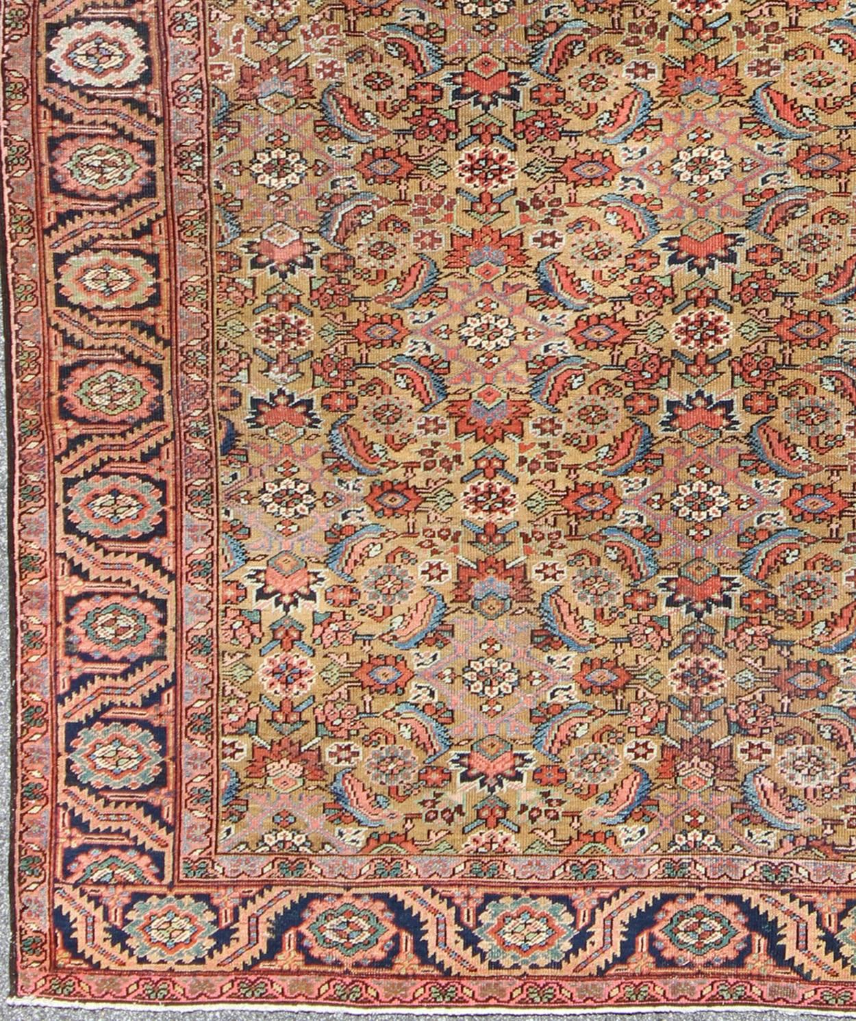 Antique Persian Bakhshaish Carpet with All Over Herati Design in Gold and Blue,
Crafted in the mineral-rich hills of northwest Persia, this superb, antique Bakshaish rug represents the best features of these prized village carpets. This exquisite