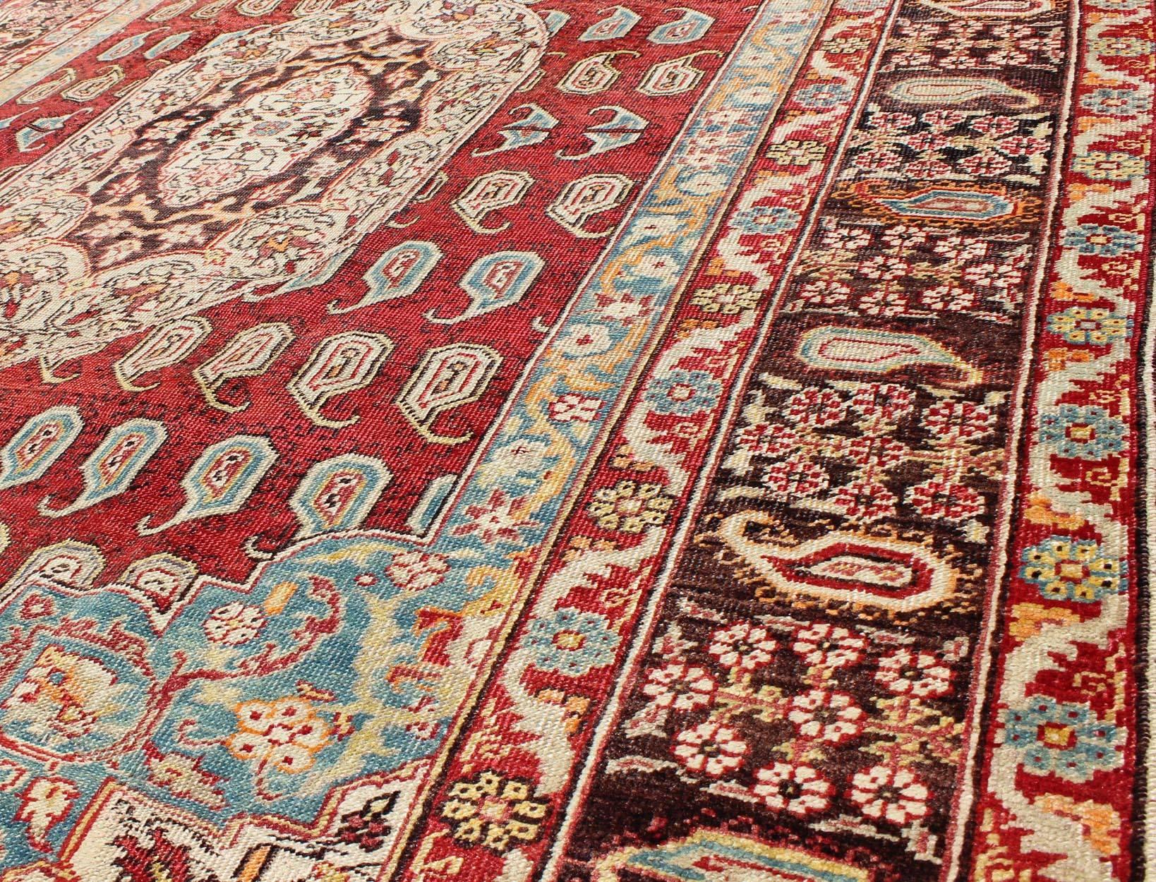 Wool Antique Turkish Oushak Rug with Paisley Design in Red, Brown and Blue For Sale