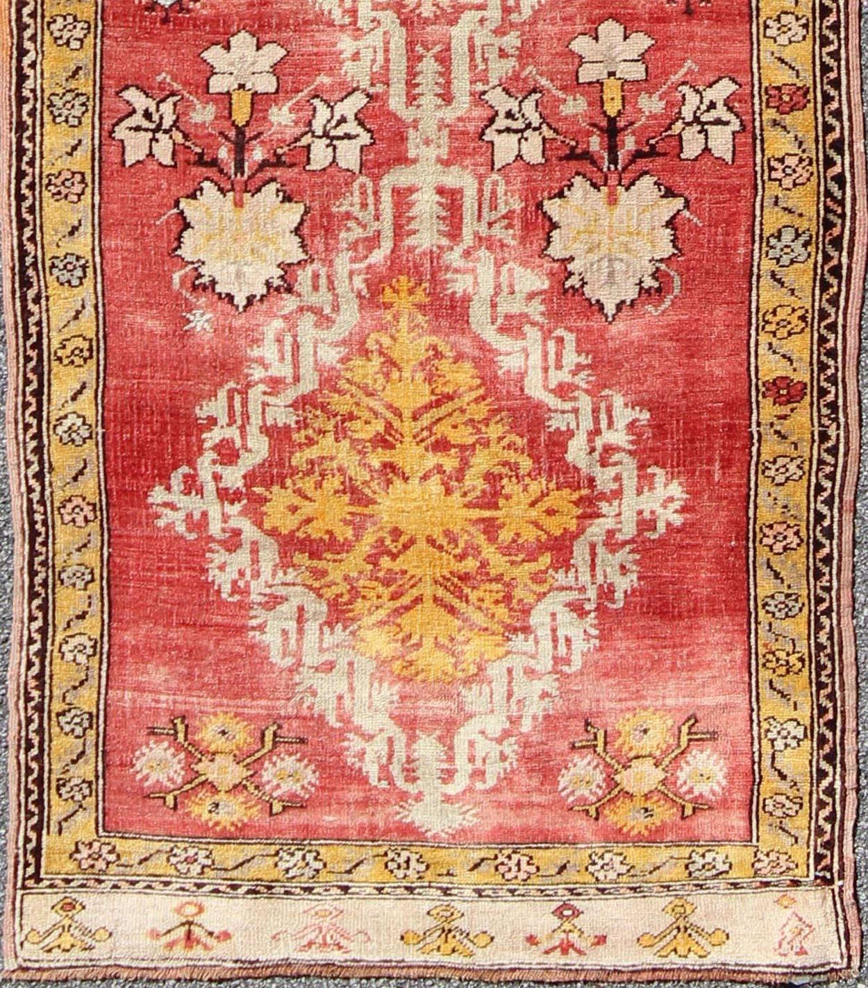 Measures: 3' x 10'3

Country of Origin: Turkey; Type: Oushak; Design: All-Over, Medallion, Sub-Tribal, Arabesque-Medallion; Keivan Woven Arts; rug NA-74546; Antique Turkish Oushak Runner with Tribal Medallions in Red, Orange, and Yellow; Antique