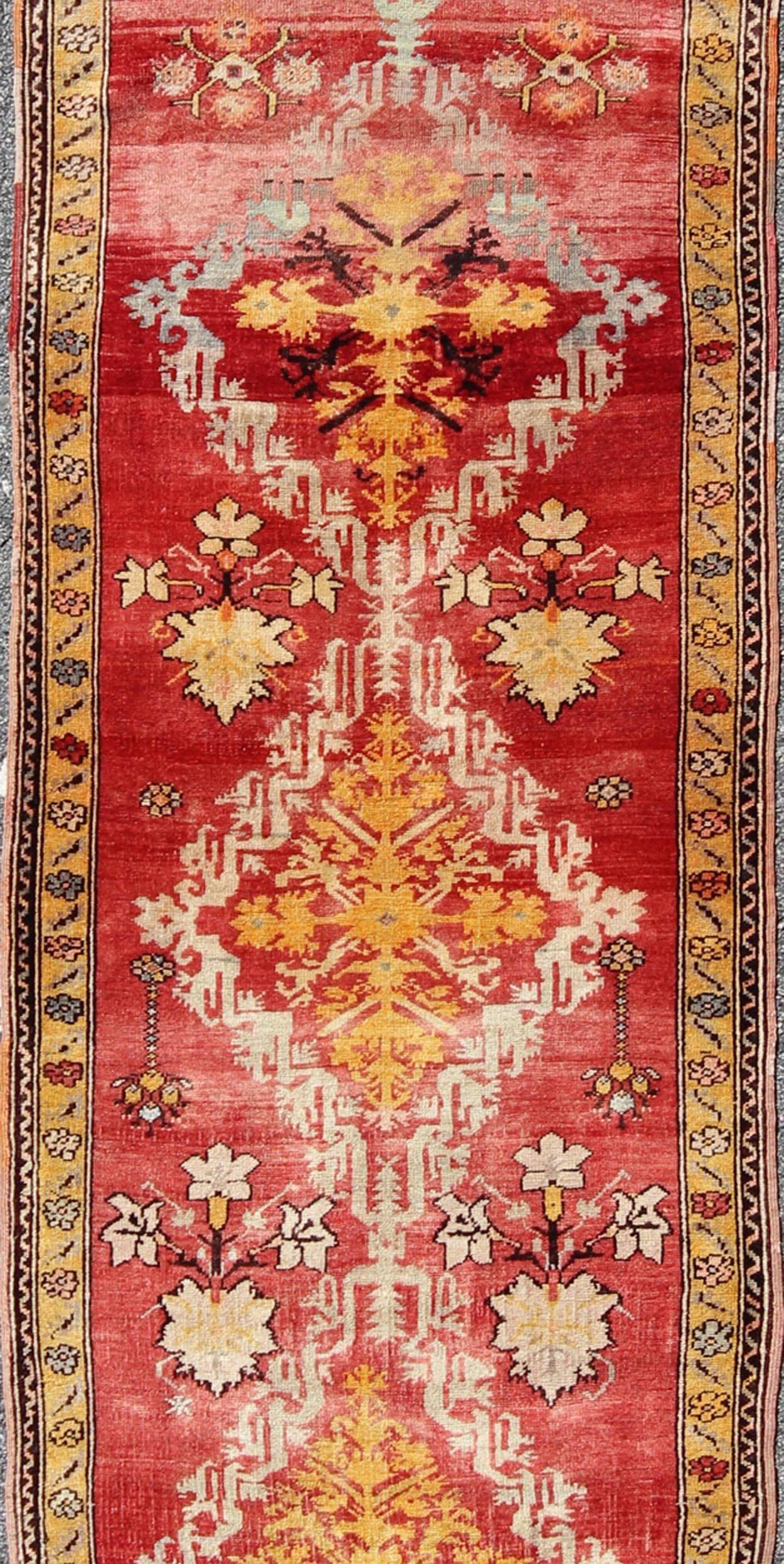 Antique Turkish Oushak Runner with Tribal Medallions in Red, Orange, and Yellow In Excellent Condition For Sale In Atlanta, GA