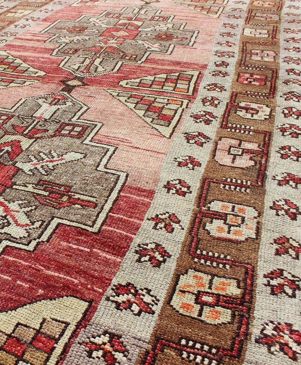 Mid-20th Century Vintage Turkish Oushak Long Runner with Rose and Pink For Sale