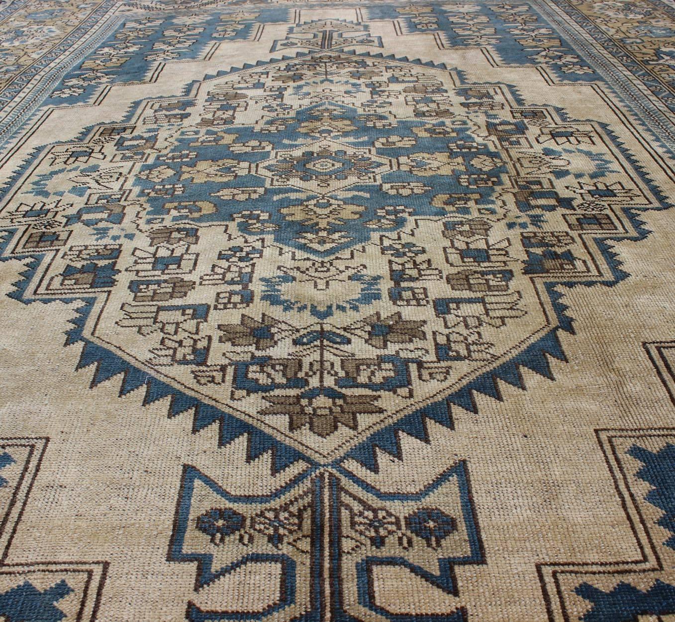 Oushak Vintage Turkish Rug with Geometric Design in Blue, Gold and Cream Colors For Sale