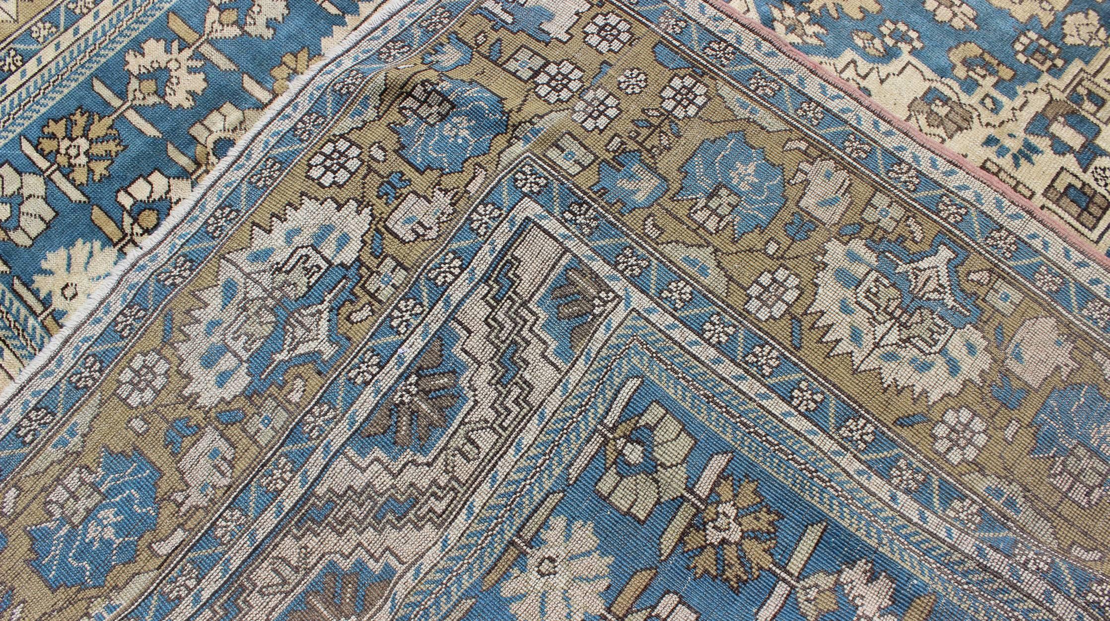 Vintage Turkish Rug with Geometric Design in Blue, Gold and Cream Colors In Good Condition For Sale In Atlanta, GA