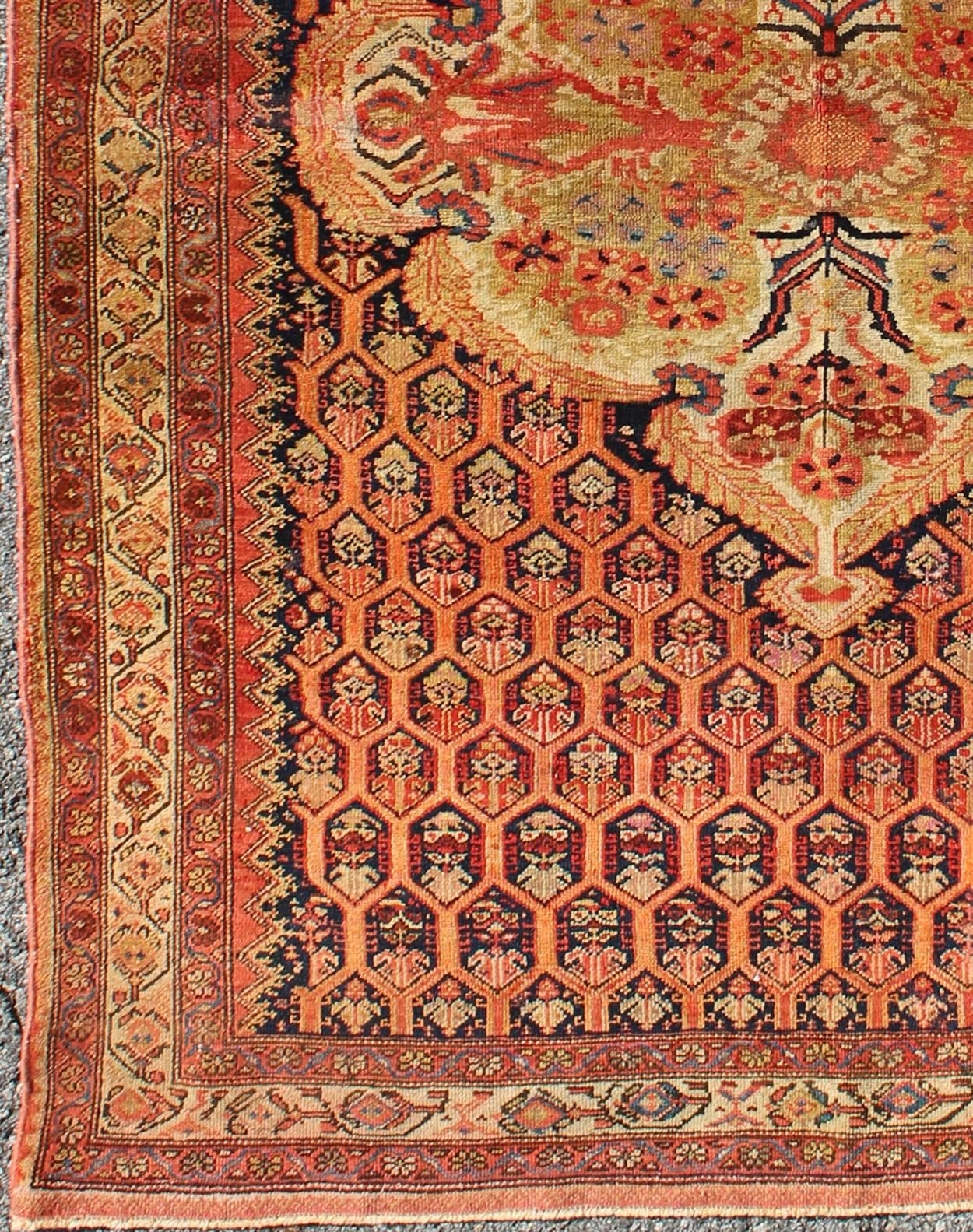 Antique Mission Malayer Rug with Floral Medallion in Blue, Orange & Green.
This amazing, antique mission Malayer rug was handwoven around the second half of the 19th Century and bears a remarkably unique medallion and all-over design. The