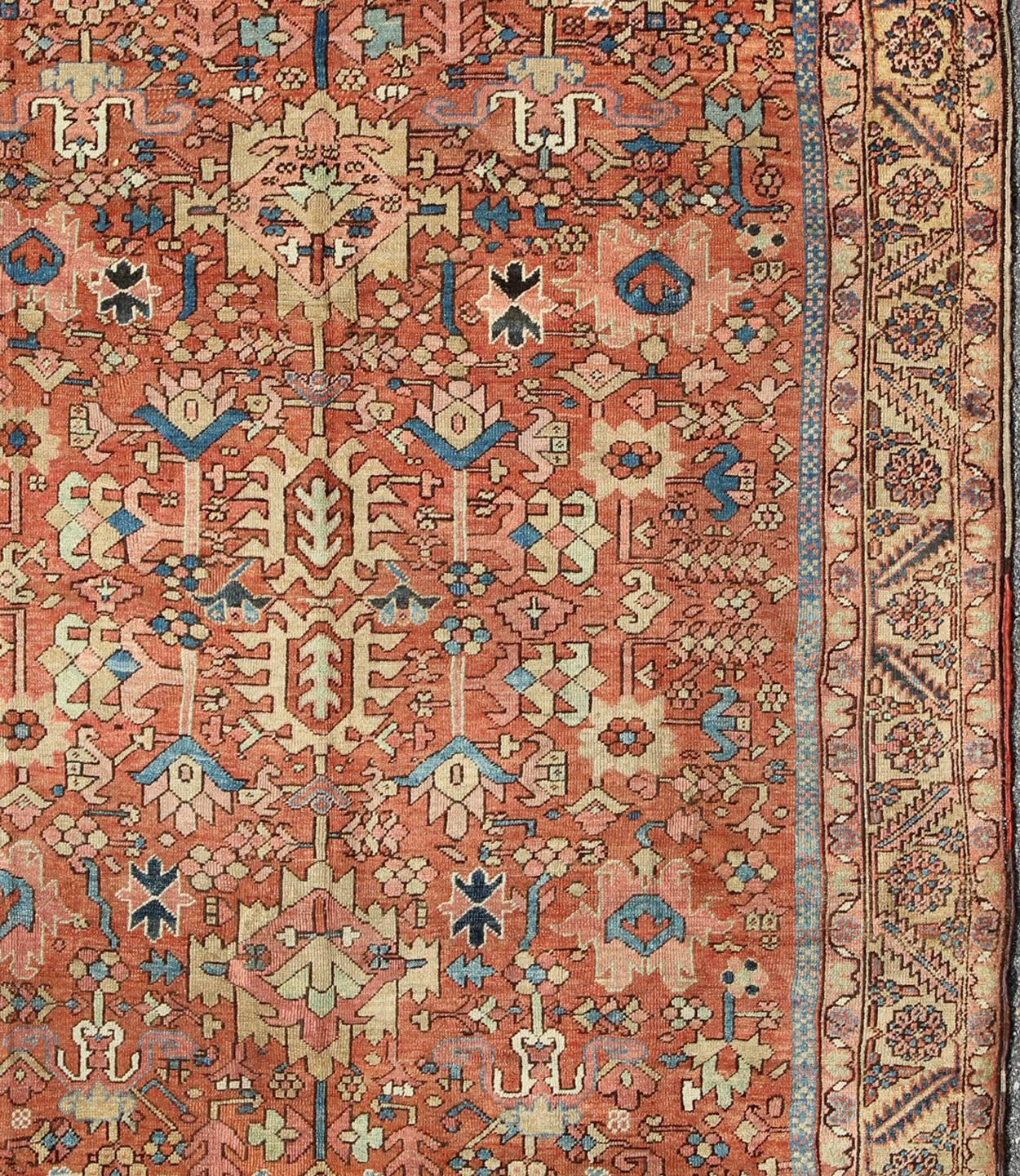 Heriz Serapi Antique All-Over Persian Heriz Rug in Faded Rust and Gold Colors