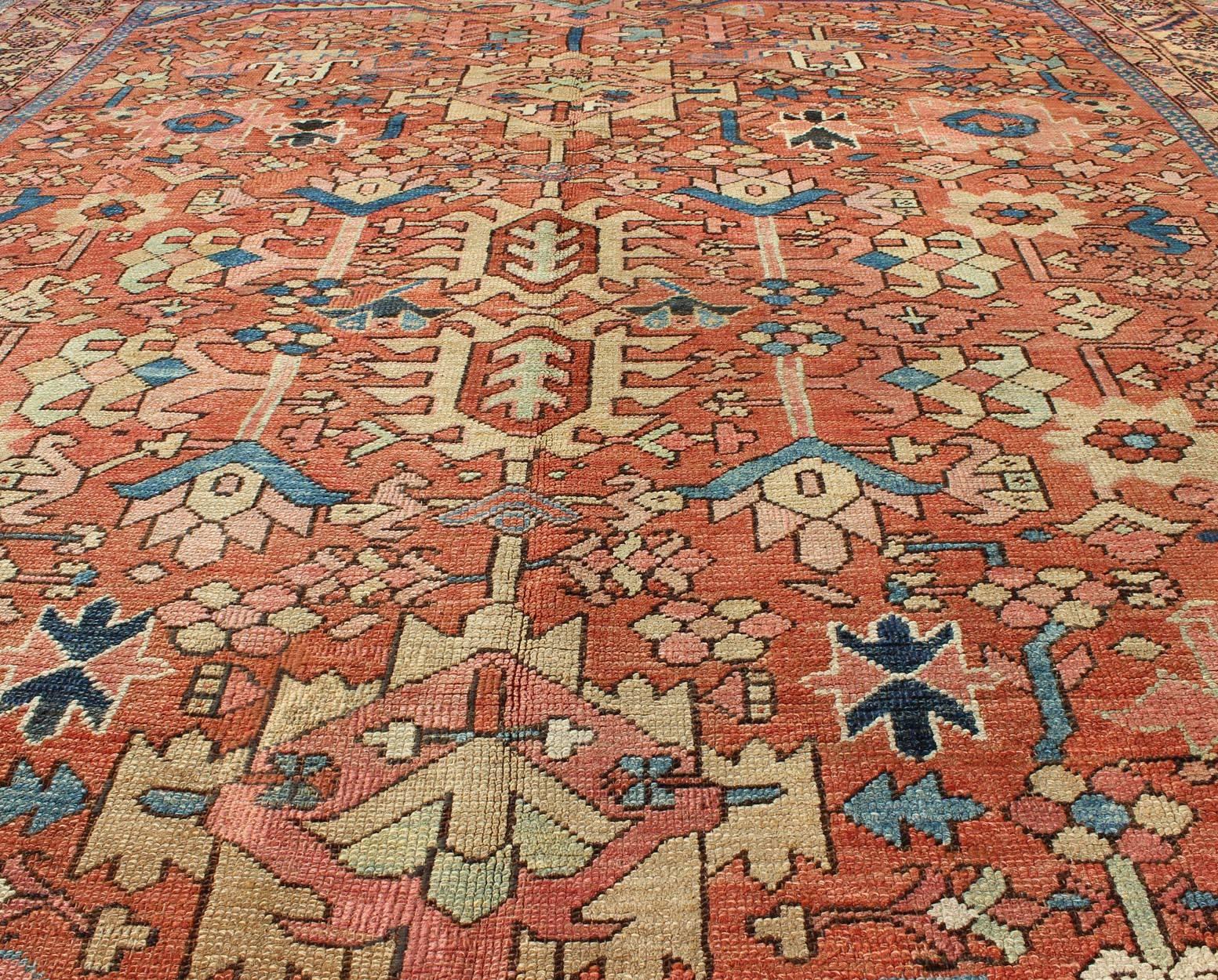 Antique All-Over Persian Heriz Rug in Faded Rust and Gold Colors In Excellent Condition In Atlanta, GA